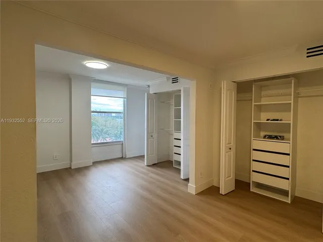 a view of a lake with a yard