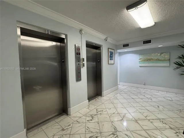 an aerial view of a city with lake view