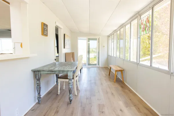 a room with a table and a window