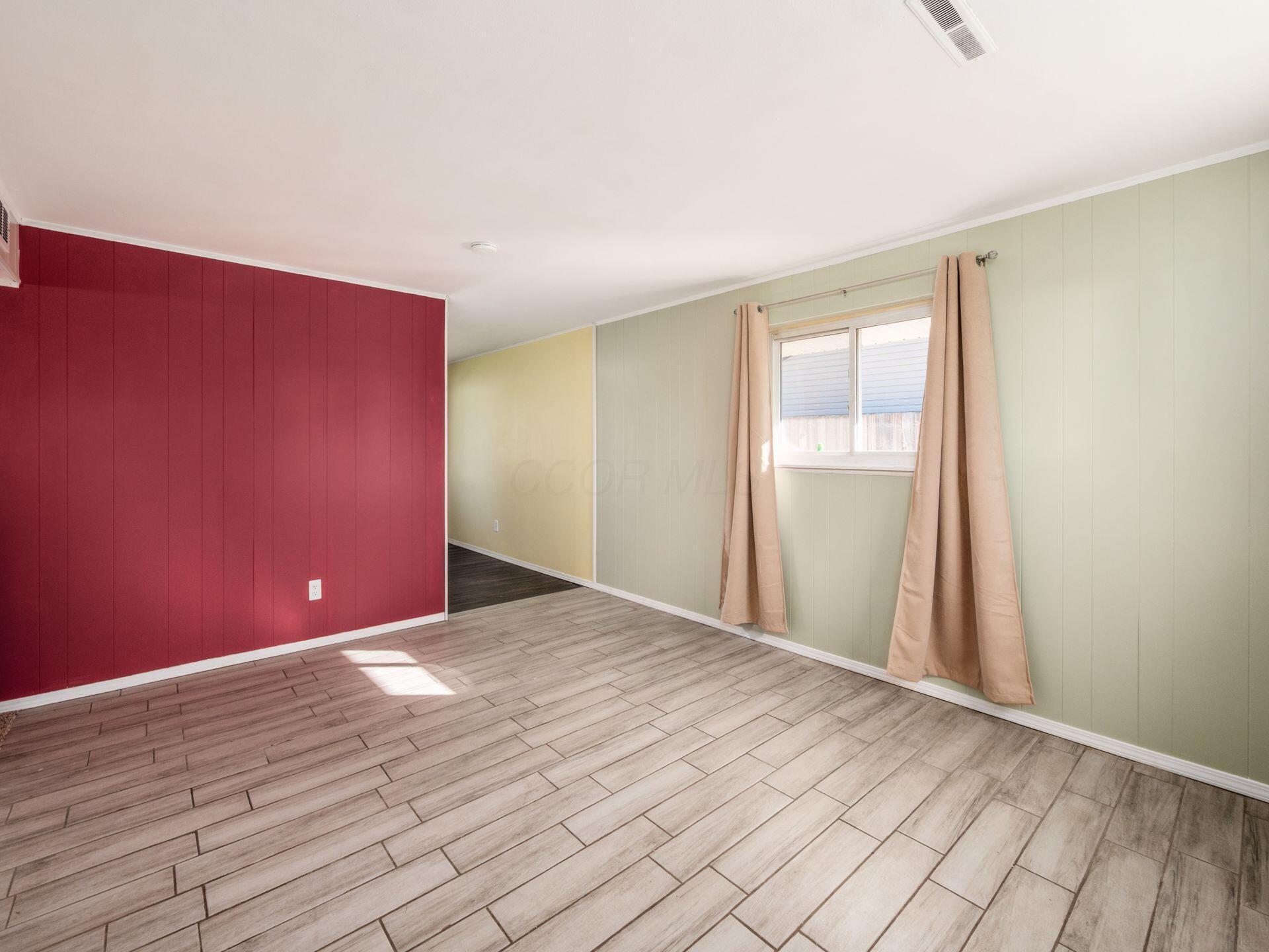 884 Bruckner Road Columbus, OH 43207 - Photo 7 of 29 Freshly Painted Walls with 1 Accent wall painted red