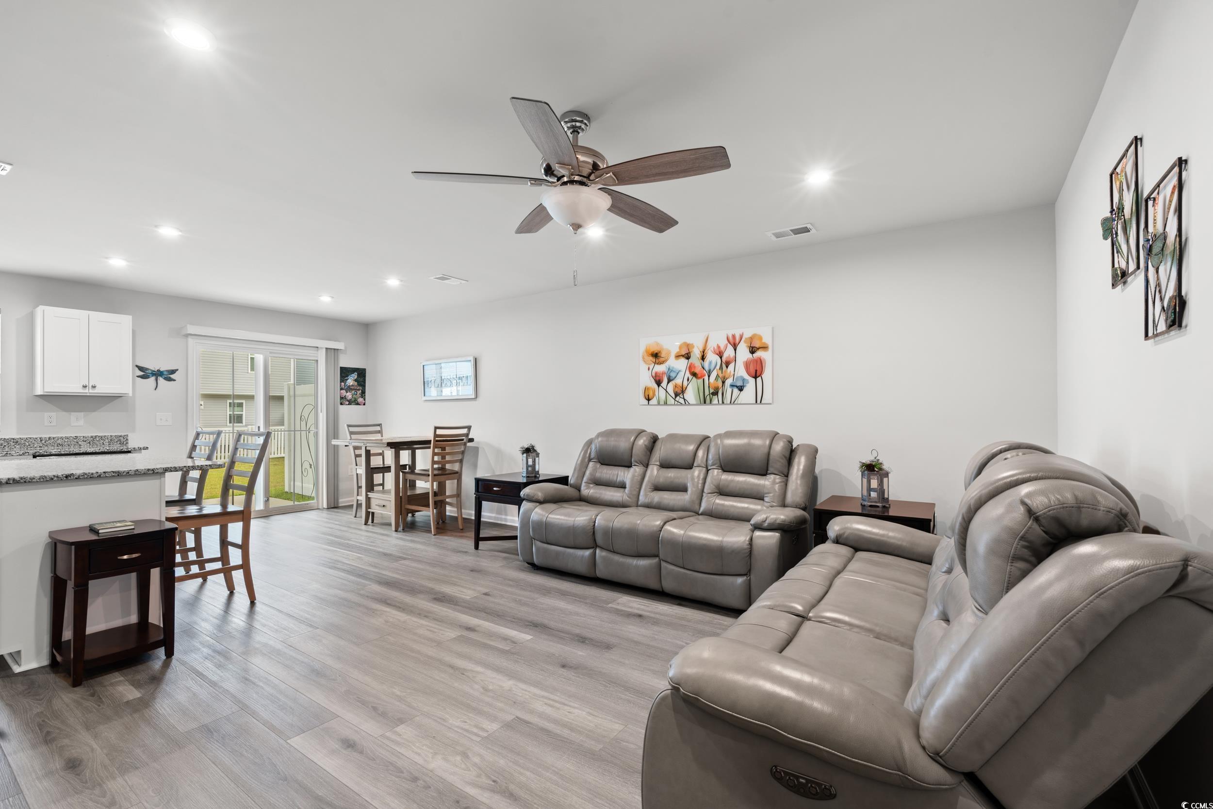 301 Granada Street, Unit D Myrtle Beach, SC 29579 - Photo 2 of 33 Living room with light wood-type flooring, recessed lighting, and ceiling fan