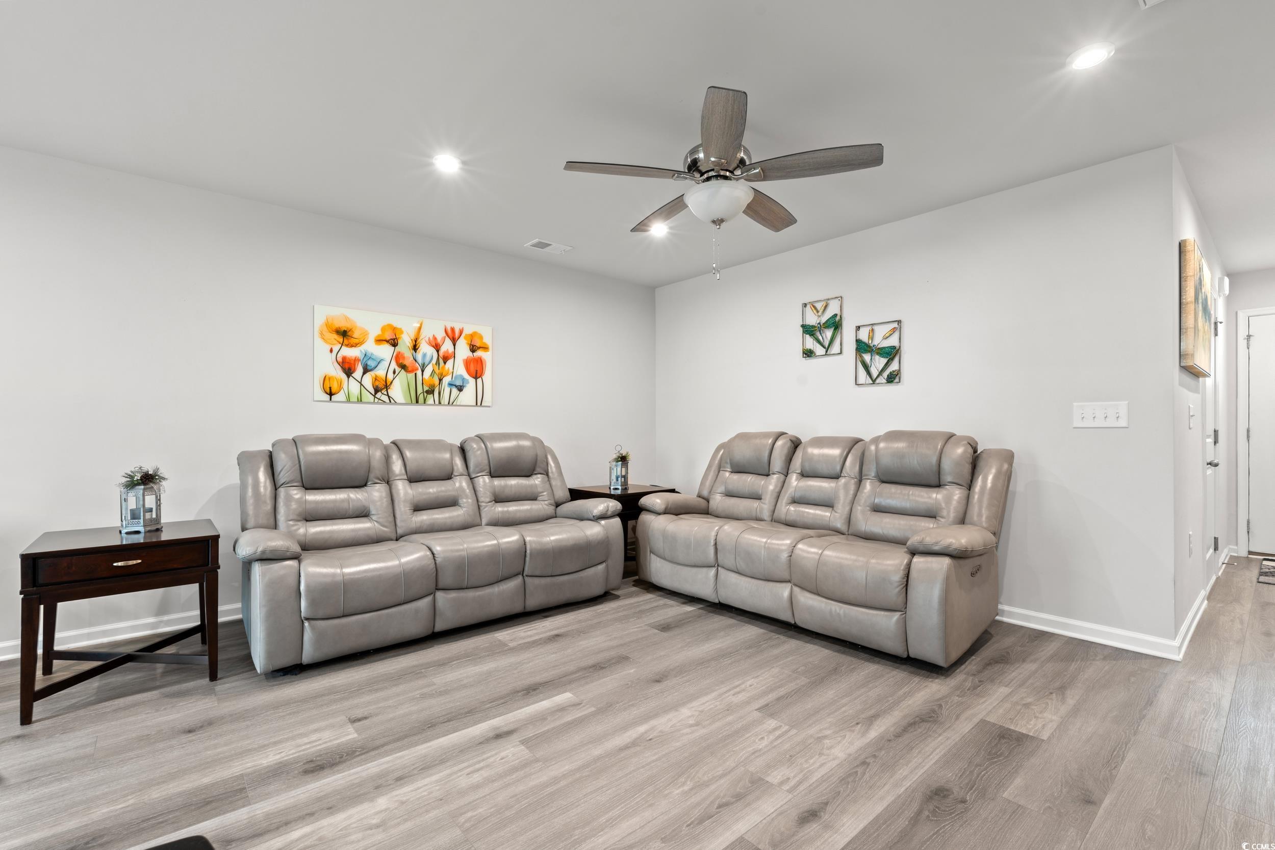301 Granada Street, Unit D Myrtle Beach, SC 29579 - Photo 6 of 33 Living area with recessed lighting, wood finished floors, and a ceiling fan