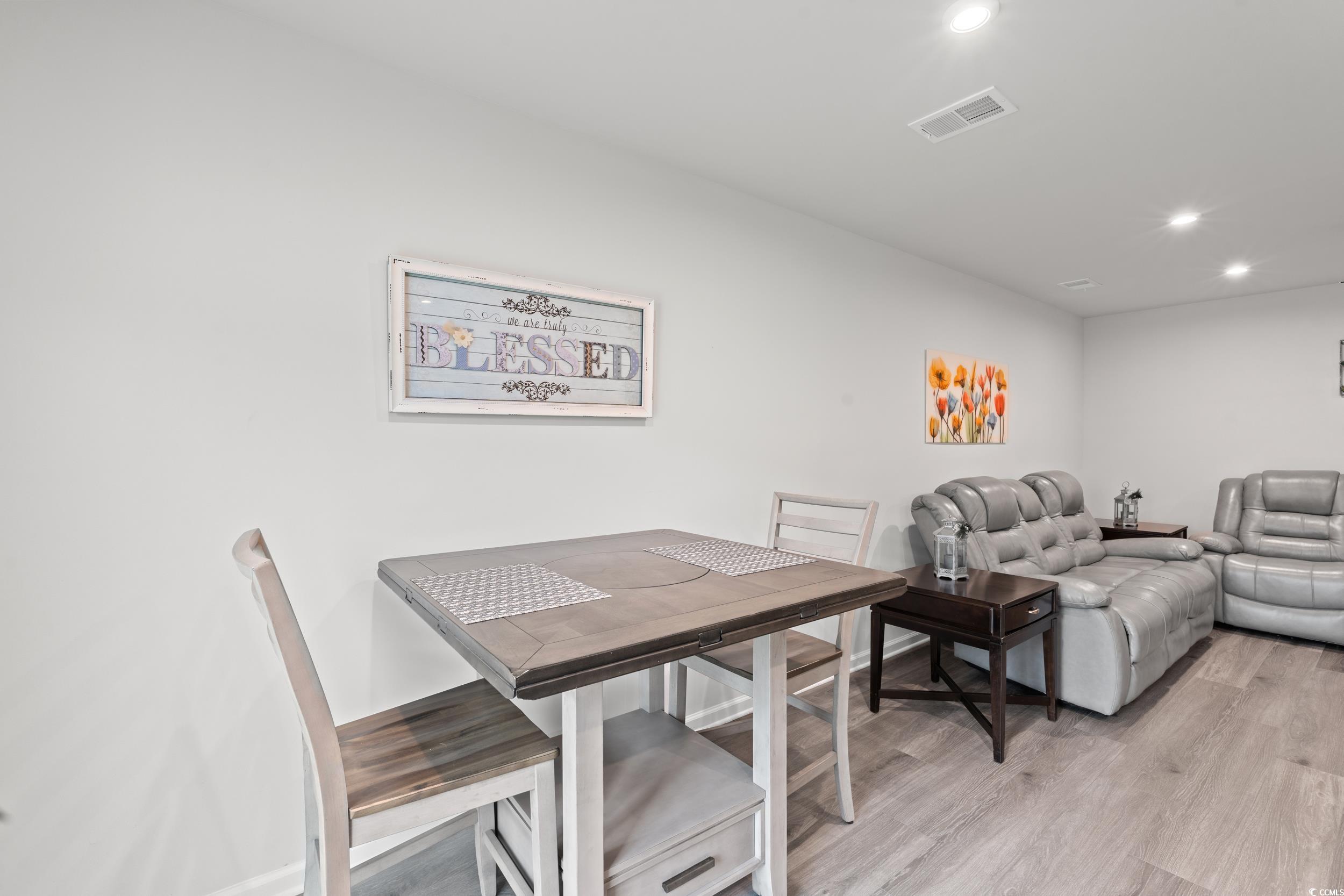 301 Granada Street, Unit D Myrtle Beach, SC 29579 - Photo 9 of 33 Dining area with recessed lighting and light wood-style floors