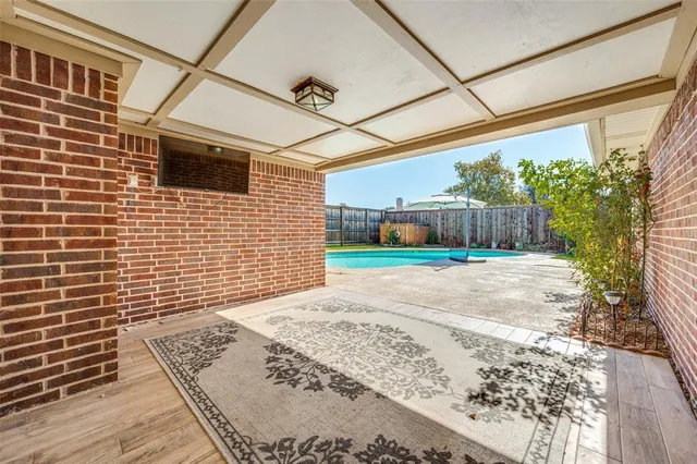 a view of backyard with small cabin