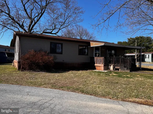 a house with trees in the background