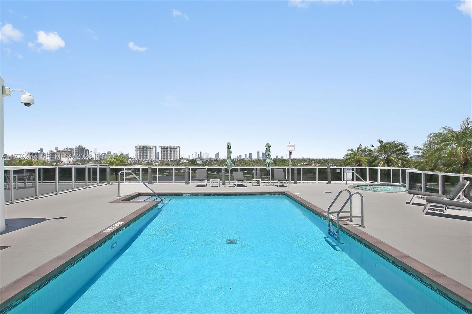 The Meridian Miami Beach, FL 33139 - Photo 19 of 27 a view of a swimming pool with a chairs