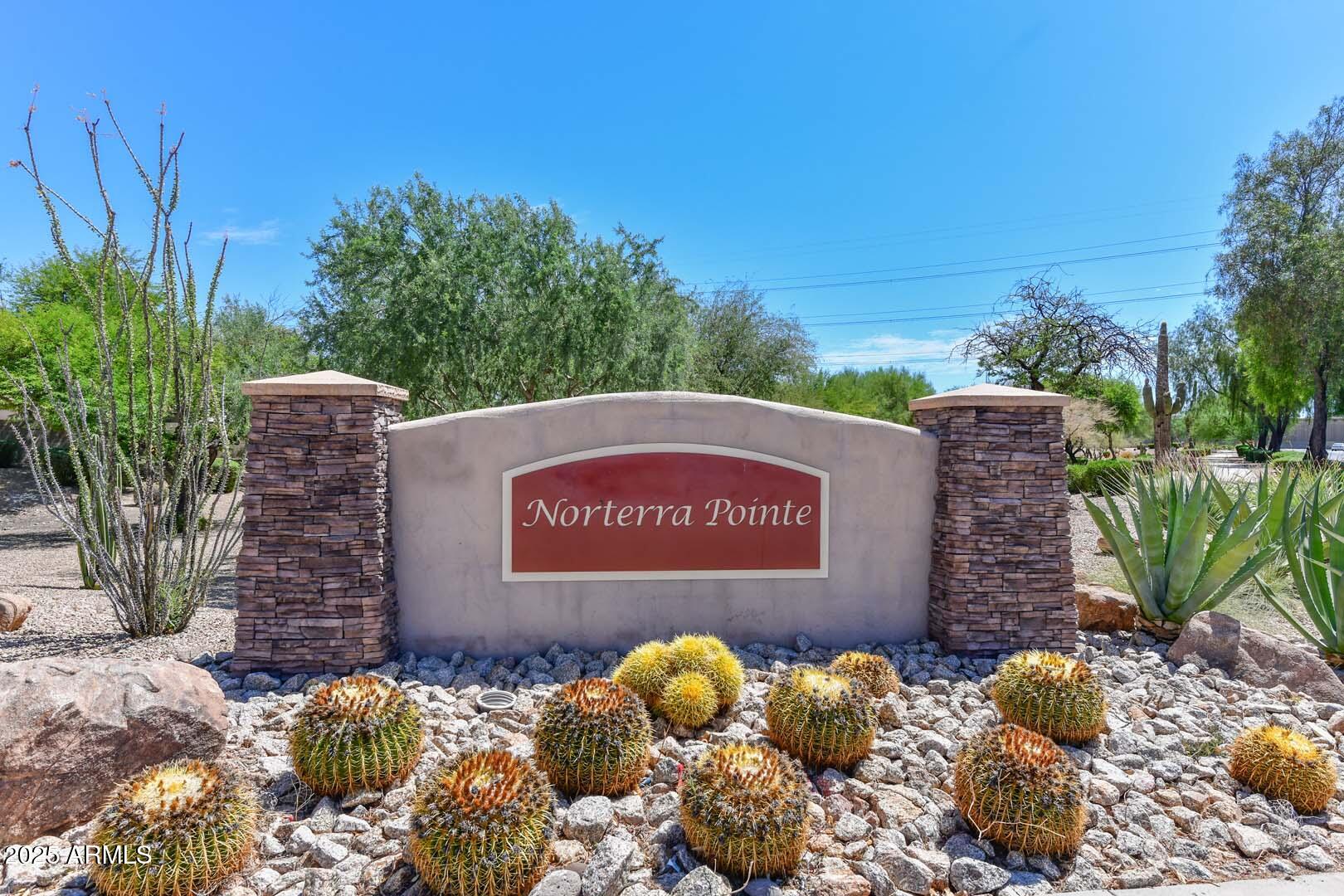 3038 West Roberta Drive Phoenix, AZ 85083 - Photo 38 of 40 a sign that is sitting on a brick wall