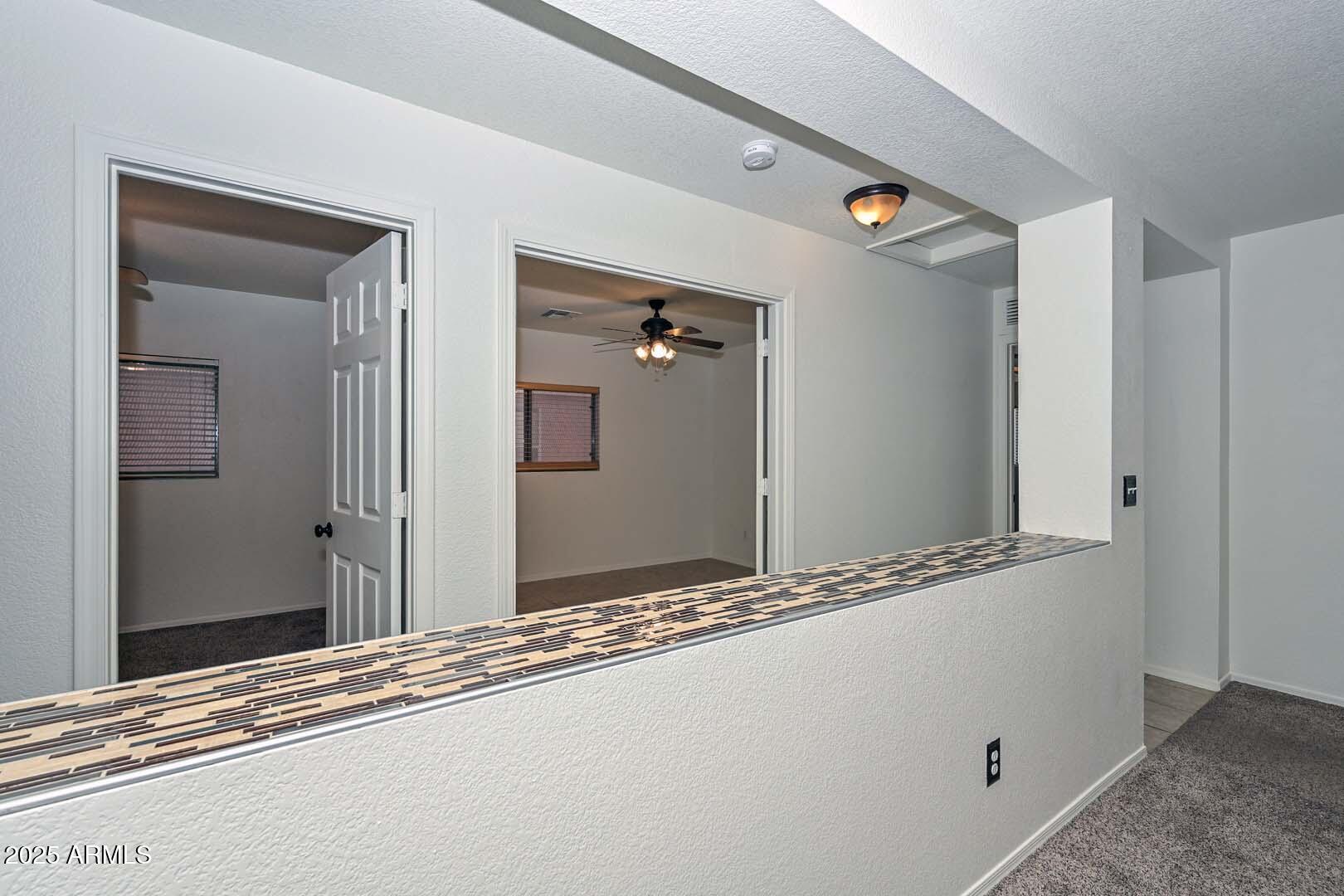 3038 West Roberta Drive Phoenix, AZ 85083 - Photo 10 of 40 a view of a hallway to a room