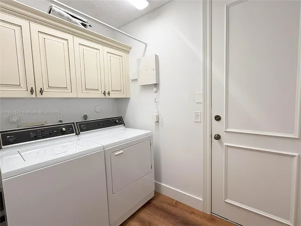 a room with dryer and washer