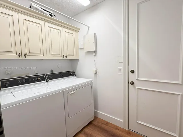 a room with dryer and washer