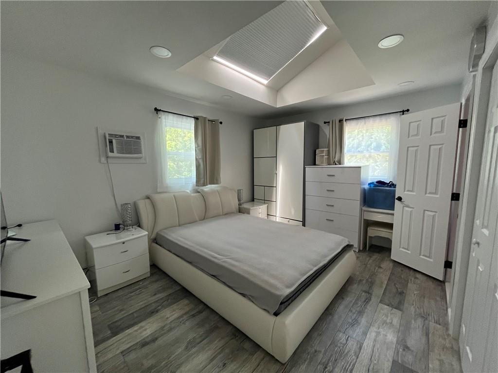 26 Venus Road Syosset, NY 11791 - Photo 4 of 8 a room with a bed and a dresser