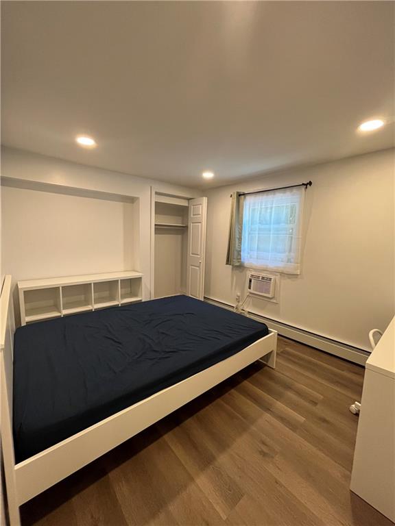 26 Venus Road Syosset, NY 11791 - Photo 6 of 8 a room with a bed and a window