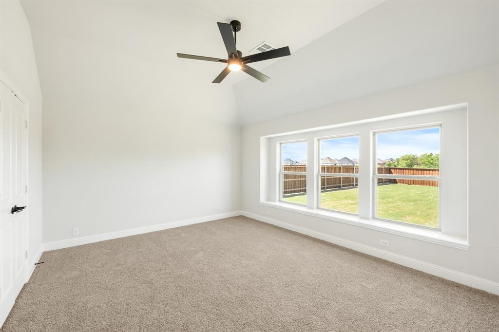 11916 Serval Street Godley, TX 76044 - Photo 16 of 35 an empty room with a window