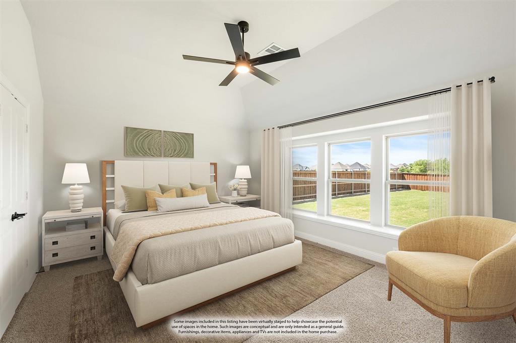 11916 Serval Street Godley, TX 76044 - Photo 17 of 35 a bedroom with a large bed and a large window
