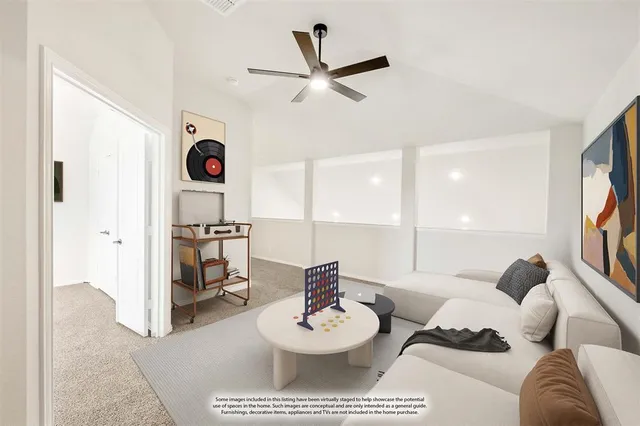 a living room with furniture and a table