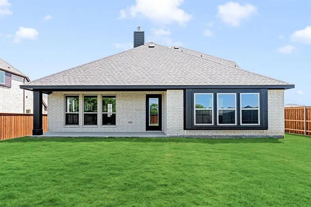 a view of a house with a garden