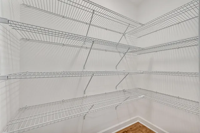 a view of a room with racks on the wall