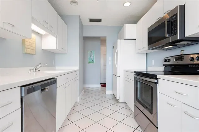 a bedroom with bed and window