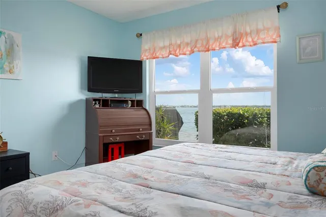 a aerial view of a house with a ocean view