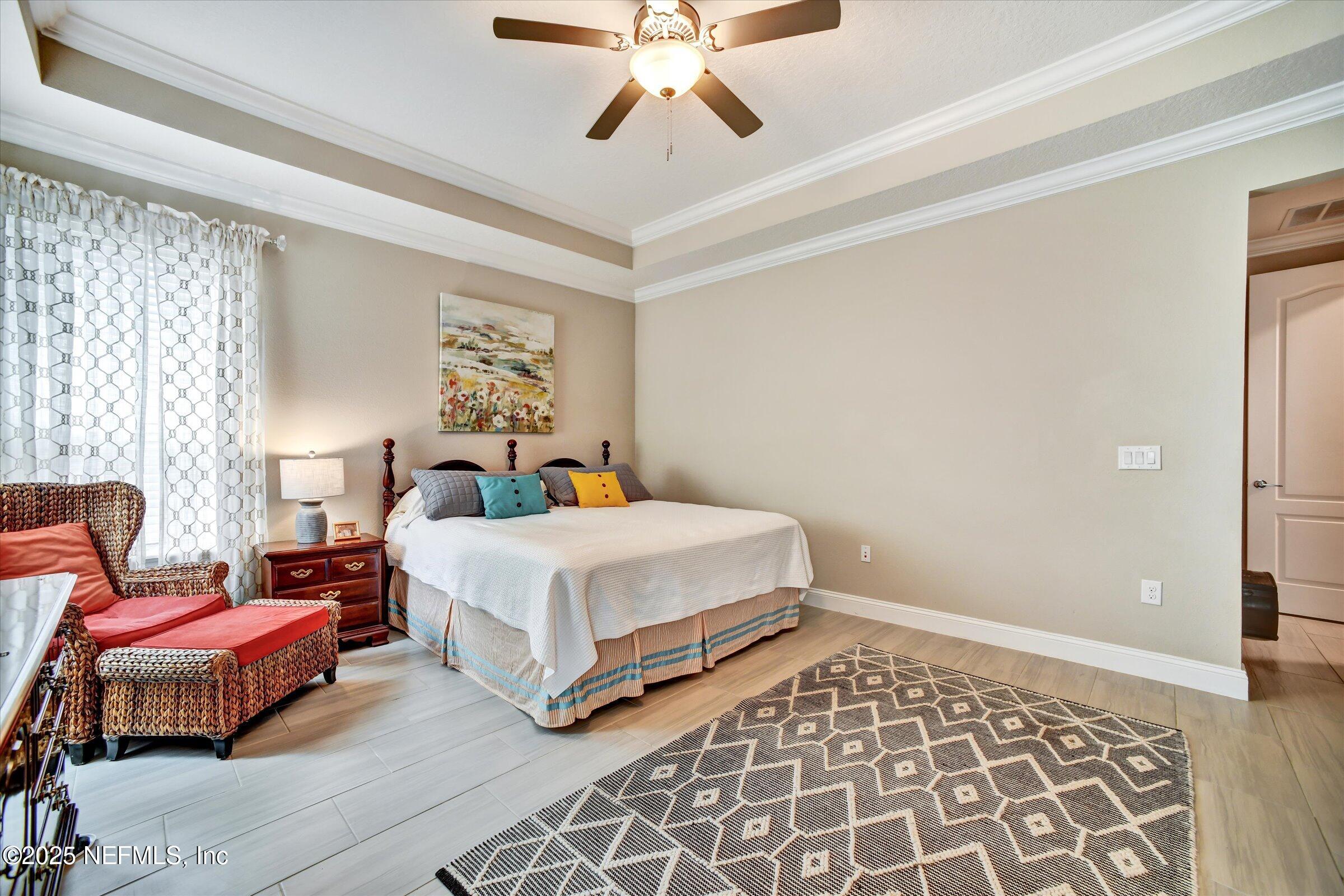 166 Oleta Way St. Augustine, FL 32095 - Photo 14 of 29 a bedroom with a bed and window