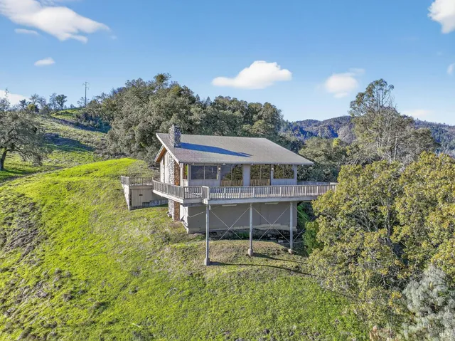 a view of a house with a mountain