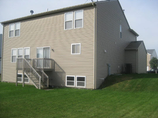 315 Ridgestone Trail Poplar Grove, IL 61065 - Photo 2 of 10 a house view with a garden space