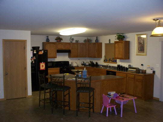 315 Ridgestone Trail Poplar Grove, IL 61065 - Photo 6 of 10 a kitchen with granite countertop furniture and a dining table