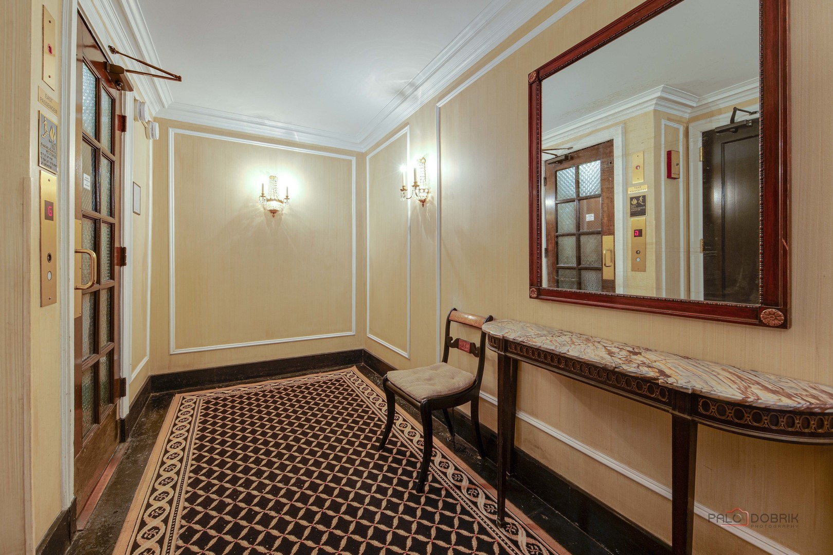 6342 North Sheridan Road, Unit 2B Chicago, IL 60660 - Photo 5 of 18 a bathroom with a sink a mirror and a shower