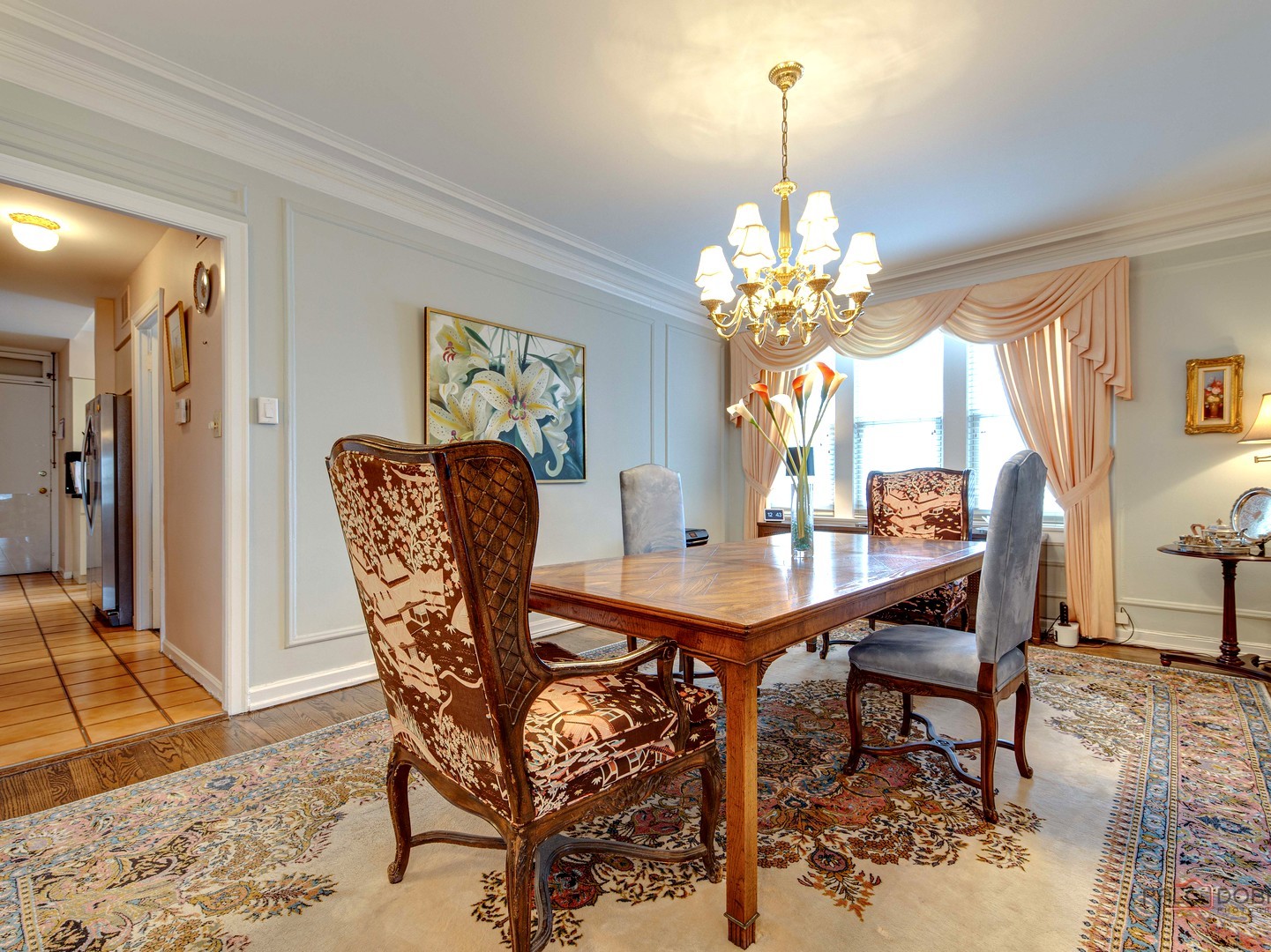 6342 North Sheridan Road, Unit 2B Chicago, IL 60660 - Photo 8 of 18 a dining room with furniture and window