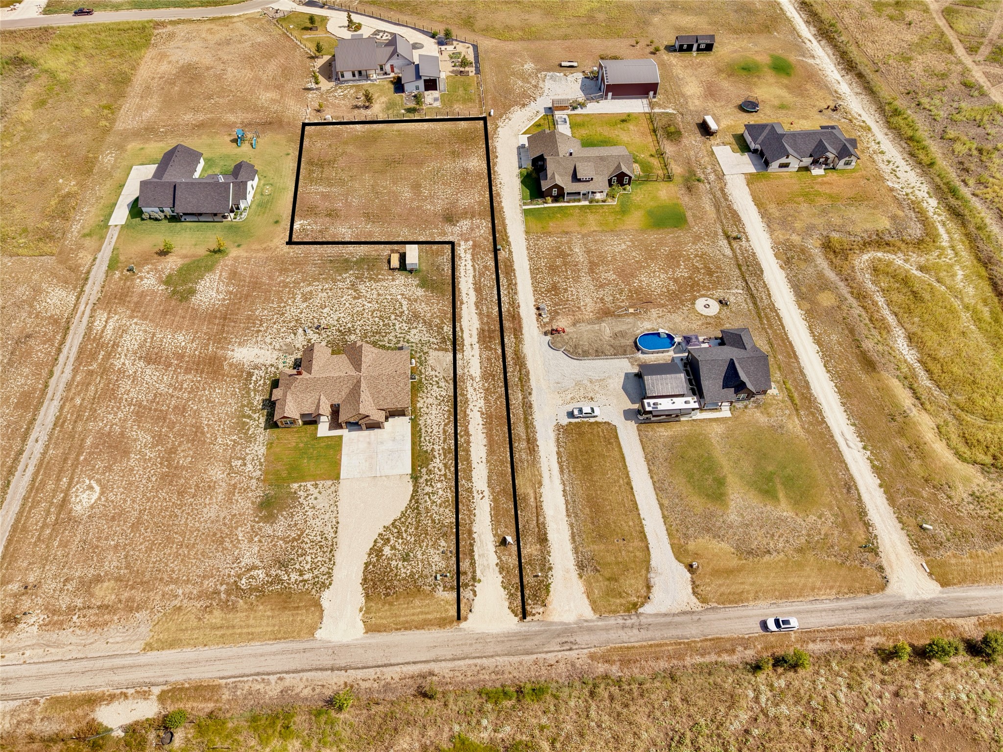 15965 Armstrong Loop Salado, TX 76571 - Photo 6 of 12 An aerial view highlights the expansive property boundaries and rural landscape surrounding the lot.