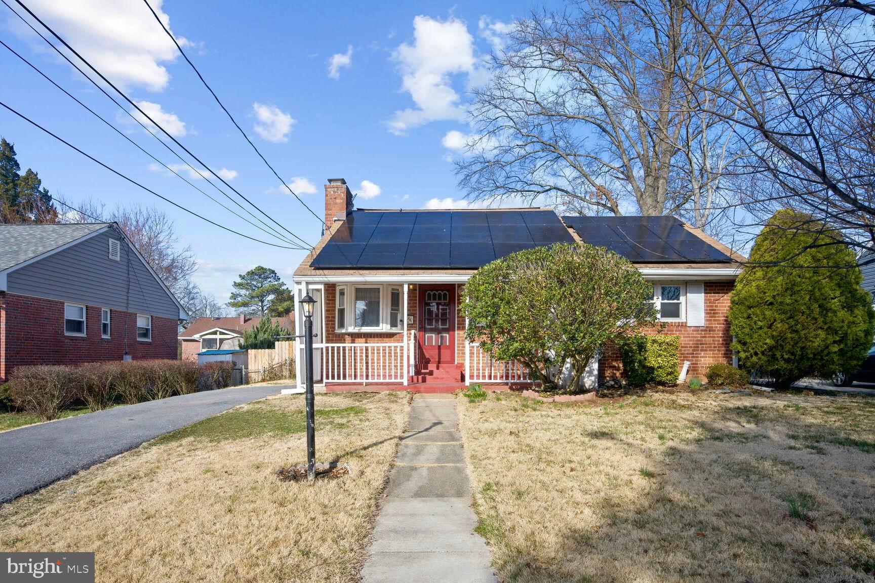 8204 17th Avenue Hyattsville, MD 20783 - Photo 1 of 36 a front view of a house with a yard
