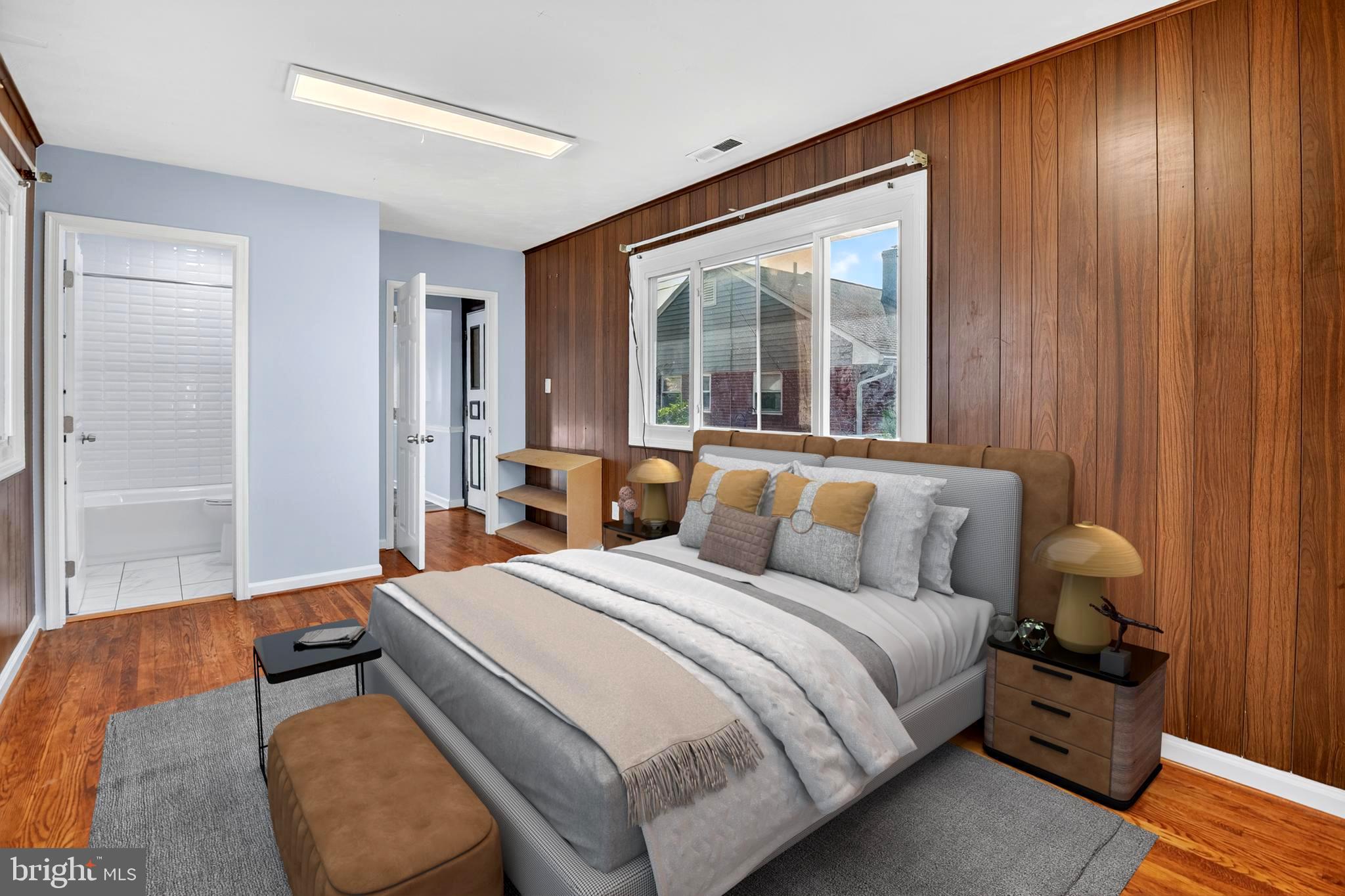 8204 17th Avenue Hyattsville, MD 20783 - Photo 16 of 36 a bed room with a bed and a window