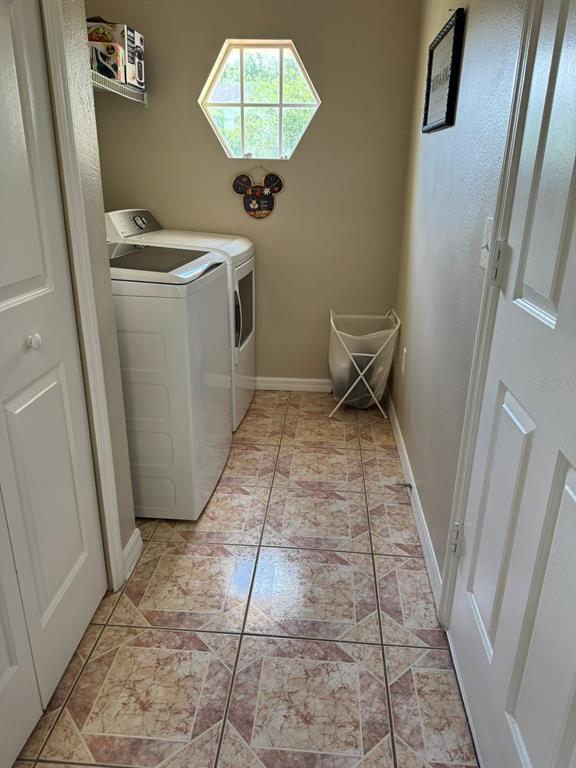 2526 Jasmine Trace Drive Kissimmee, FL 34758 - Photo 26 of 31 a view of a storage & utility room in a house