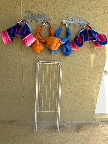 a bedroom with two bed and a window