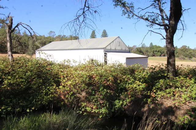 a view of a lake in front of house