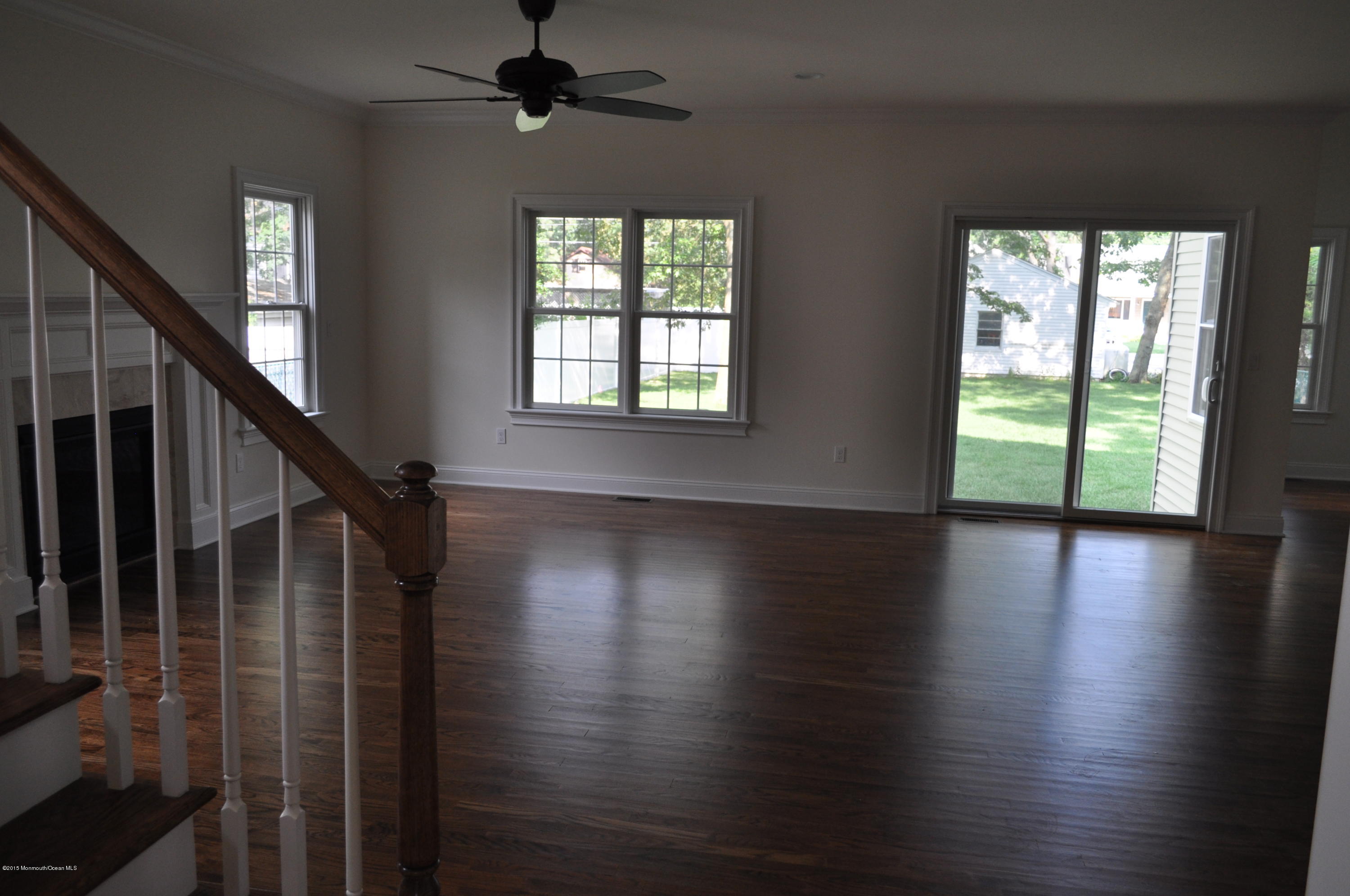 2210 N Road Point Pleasant, NJ 08742 - Photo 5 of 5 wooden floor in an empty room with a window