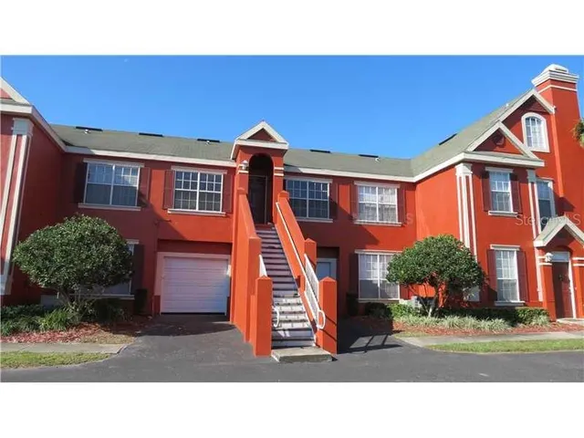a black and white house with a outdoor view