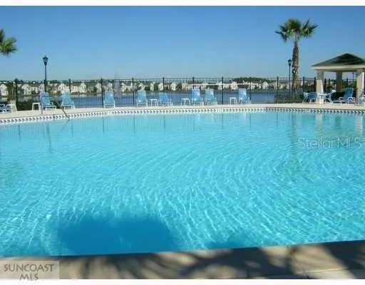 a view of a lake with a big yard