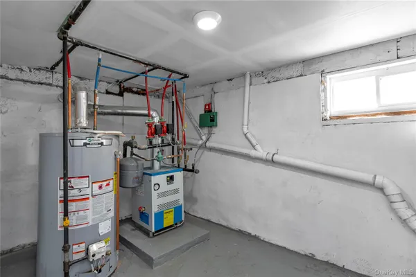 a view of a room with storage and utility room