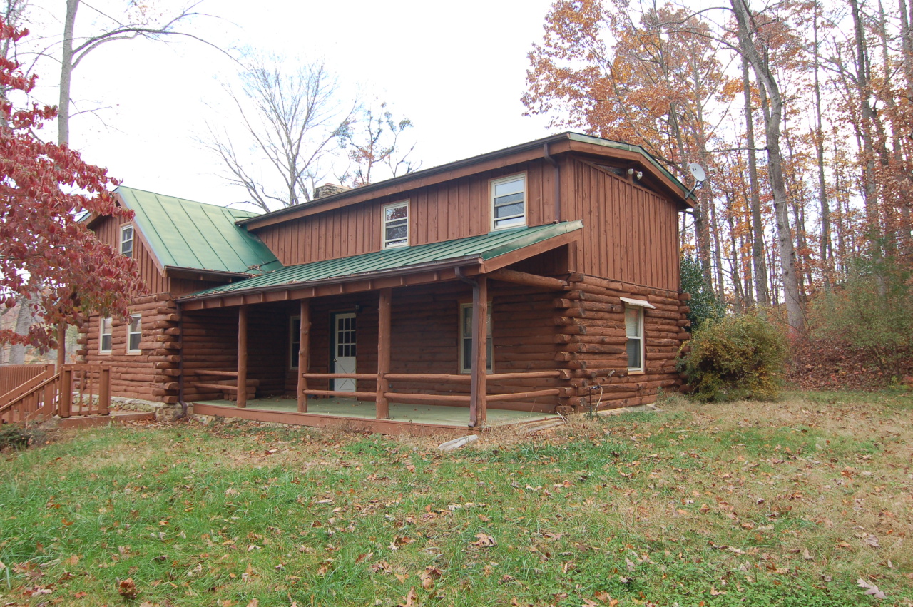 5828 Hardy Road Hardy, VA 24101 - Photo 3 of 29 a front view of a house with garden