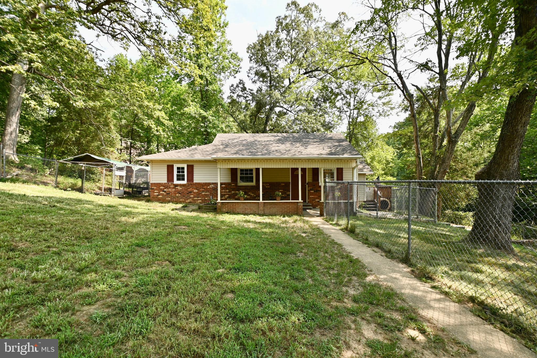 262 Decatur Road Stafford, VA 22554 - Photo 1 of 29 FRONT OF HOME WITH FENCED FRONT YARD