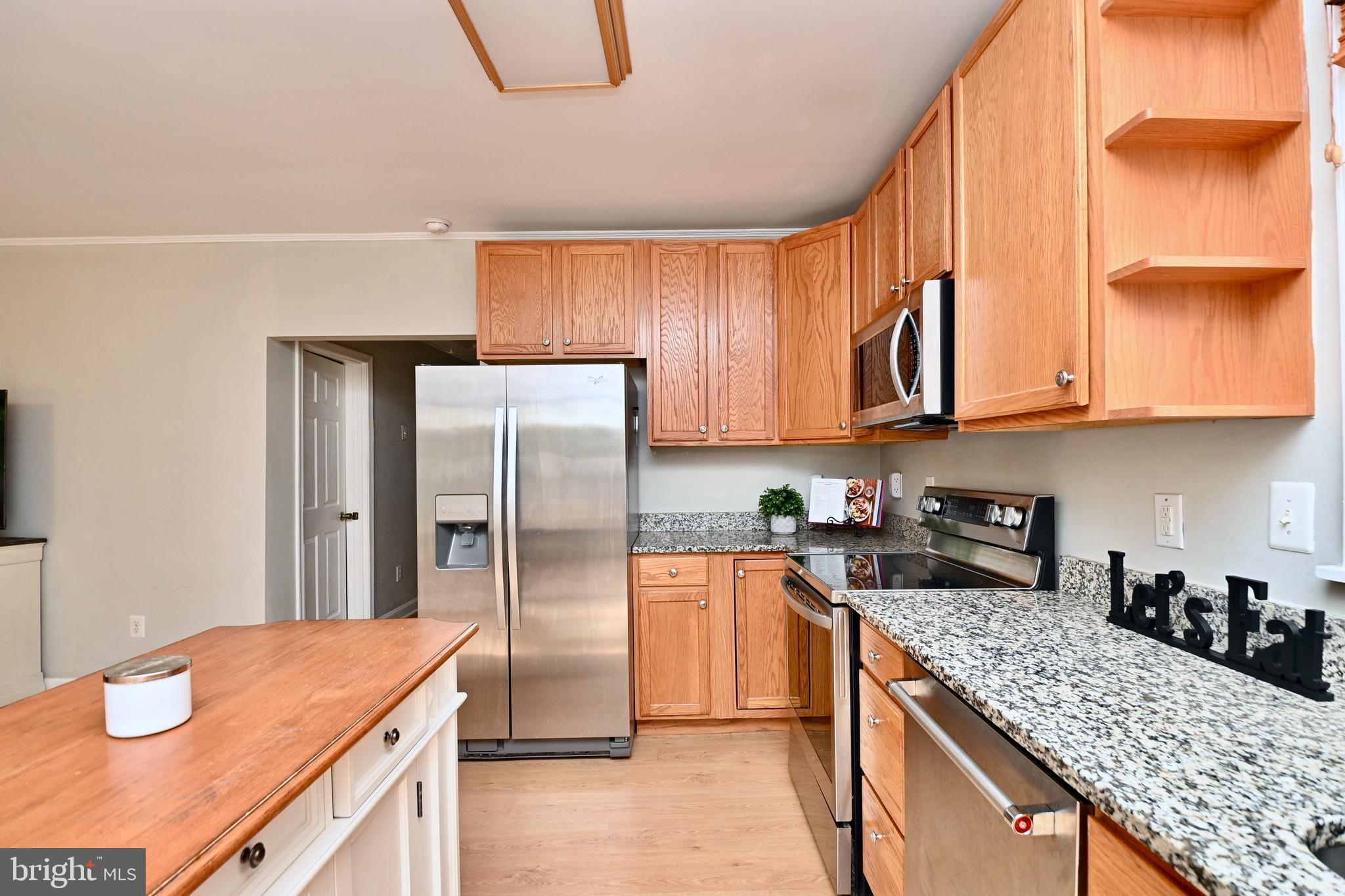 262 Decatur Road Stafford, VA 22554 - Photo 11 of 29 KITCHEN WITH GRANITE COUNTERTOPS
