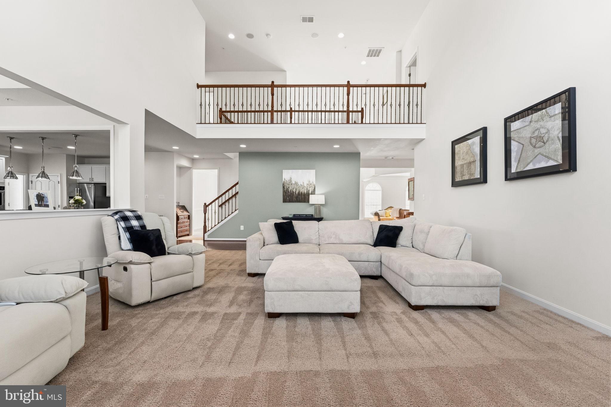 11904 Parallel Road Bowie, MD 20720 - Photo 13 of 86 a living room with furniture wooden floor and white walls