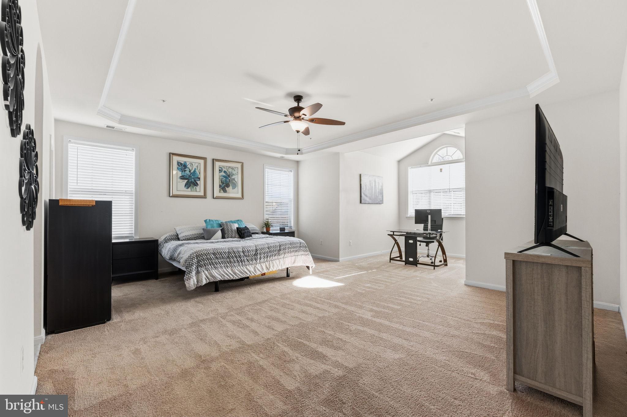 11904 Parallel Road Bowie, MD 20720 - Photo 38 of 86 a bedroom with furniture and a flat screen tv