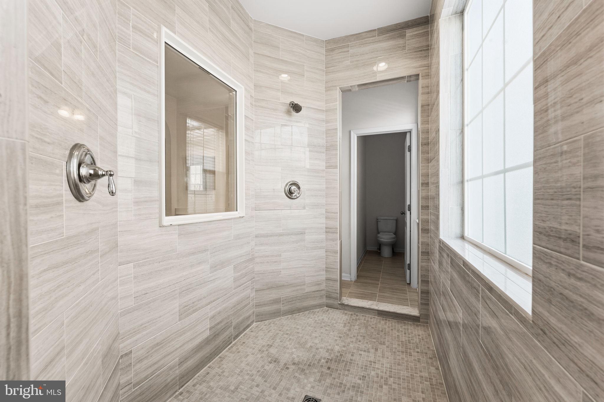 11904 Parallel Road Bowie, MD 20720 - Photo 43 of 86 Standing Shower W/ Dual Shower Heads