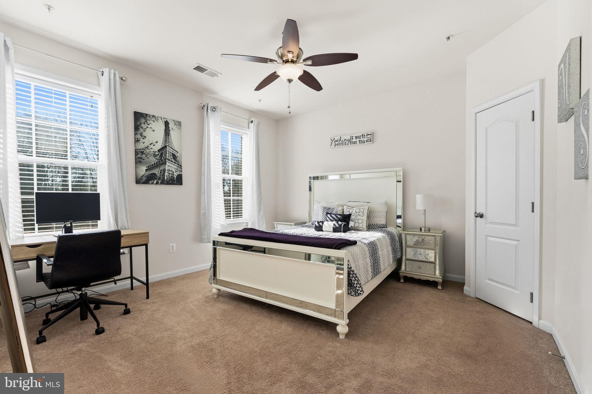 11904 Parallel Road Bowie, MD 20720 - Photo 45 of 86 a bed room with a bed and a window