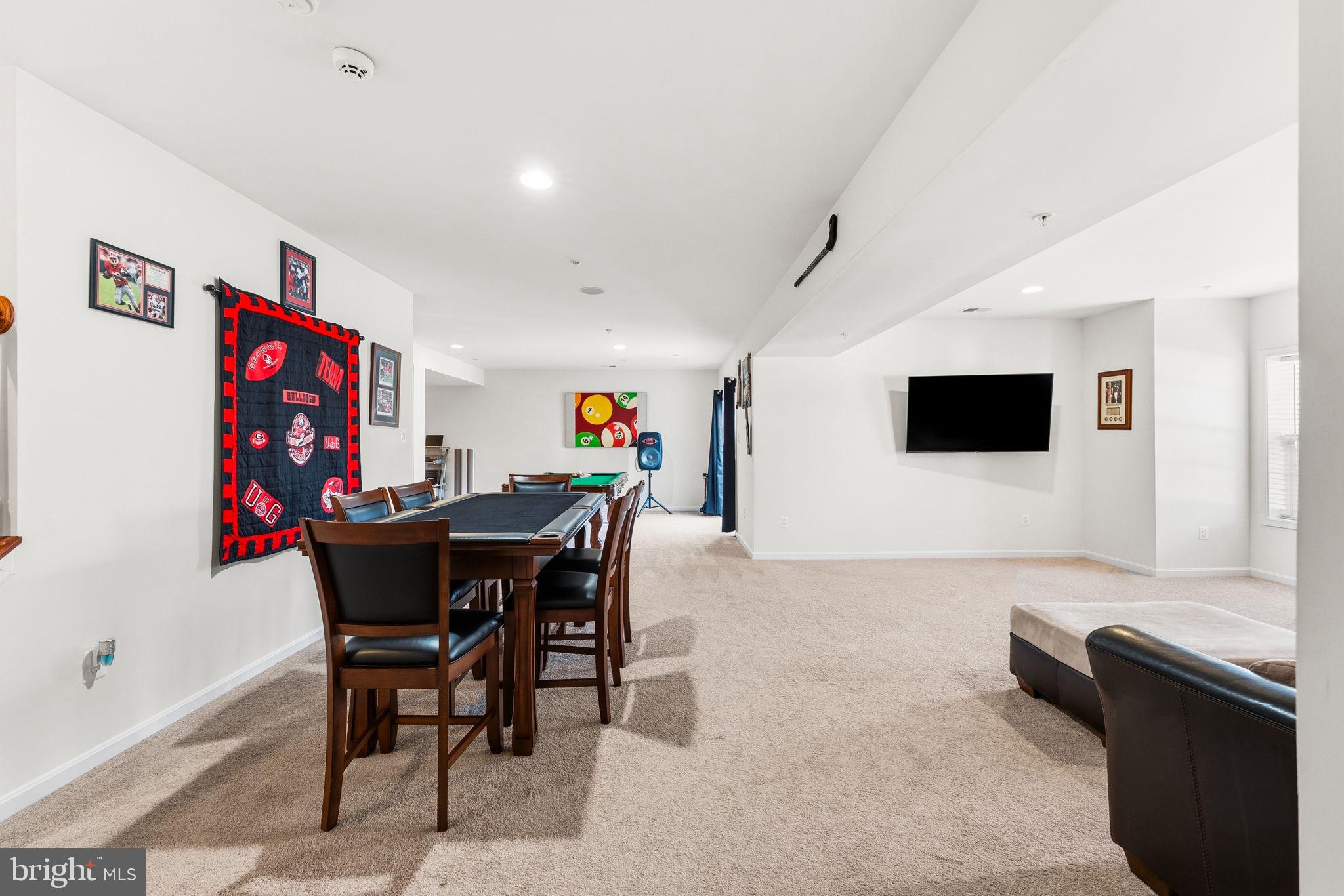 11904 Parallel Road Bowie, MD 20720 - Photo 54 of 86 a view of a dining room with furniture and wooden floor