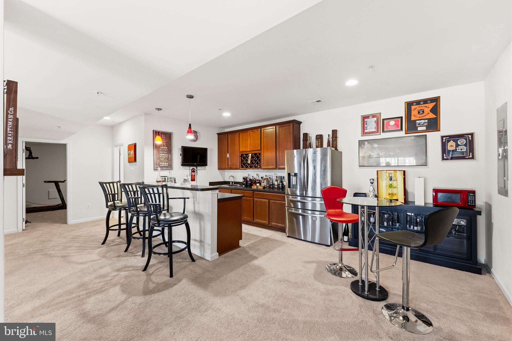 11904 Parallel Road Bowie, MD 20720 - Photo 58 of 86 a living room with lots of furniture and kitchen view