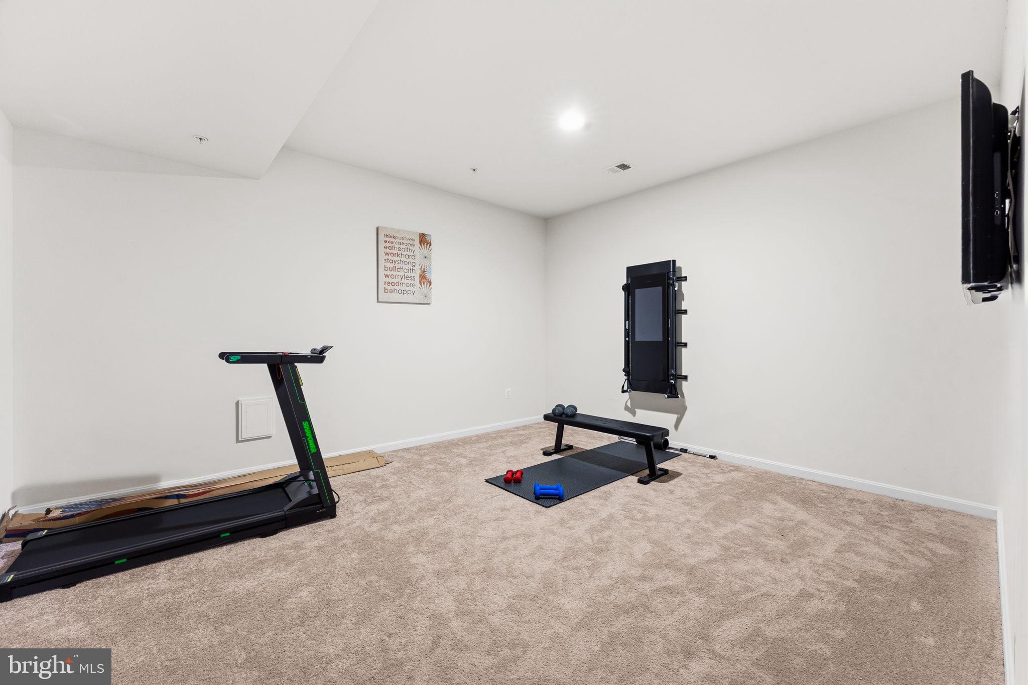 11904 Parallel Road Bowie, MD 20720 - Photo 64 of 86 a living room with a couch and a window