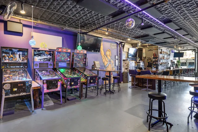 a view of a patio with a table and chairs